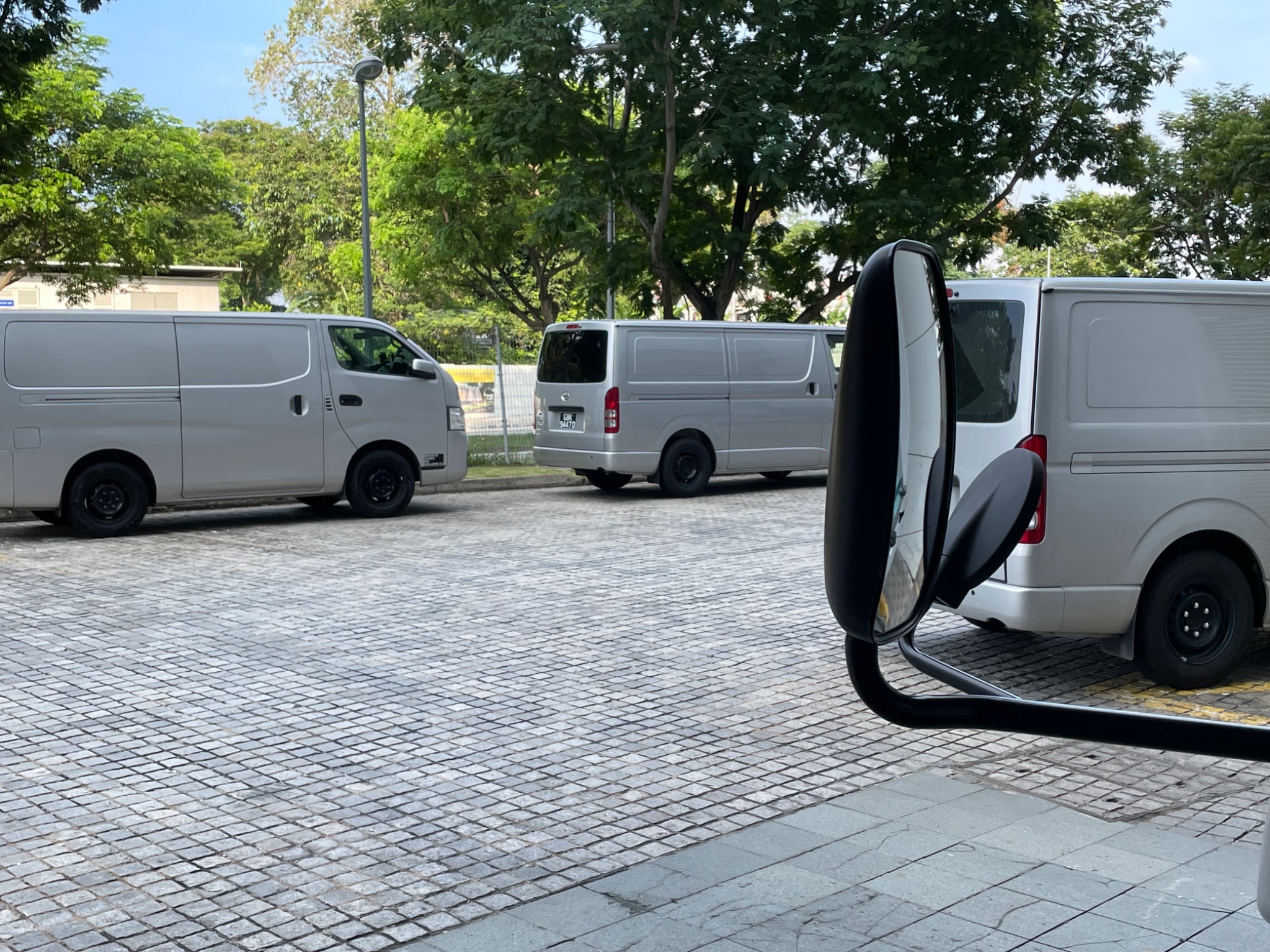 KY Project Management delivery vans operating in Singapore