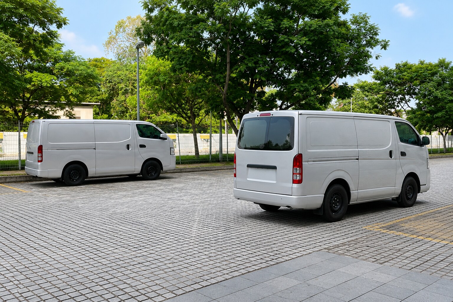 KY Project Management delivery vans ready for deployment in Singapore